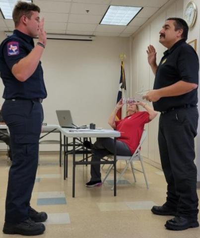 Trace Greathouse is sworn in as the OCESD#1's newest full-time fireman by Fire Chief Robert Smith at their recenst Board of Commissioners meeting.