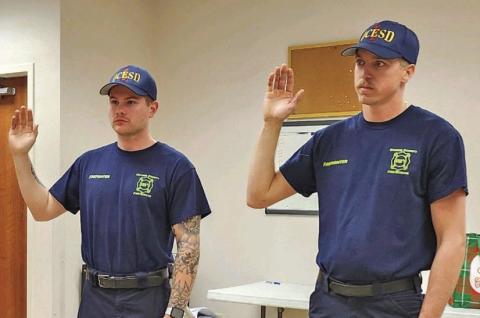 OCESD#1’s newest personnel are pictured as they are sworn in. Left to right are Hunter Bland and Justin Journeay.
