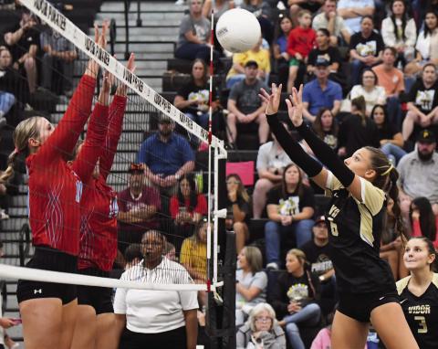 Lady Pirate Paislee Miller returns the ball in Friday night’s loss to Lumberton.