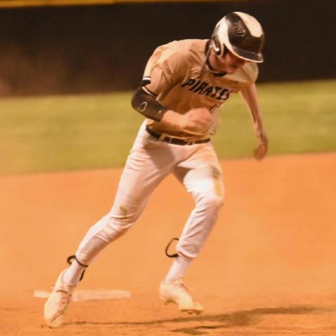 Regan Weiblinger puts his head down and heads for home plate in Friday’s game versus Bridge City. Photo by Randall Luker