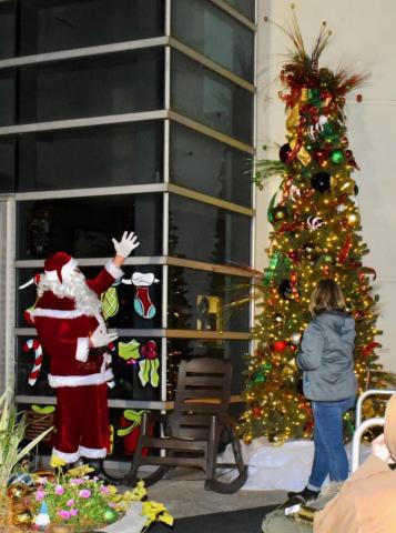 Santa and Mayor light the town Christmas tree during this year's annual Hometown Holidays celebration. Photo by Randall Luker