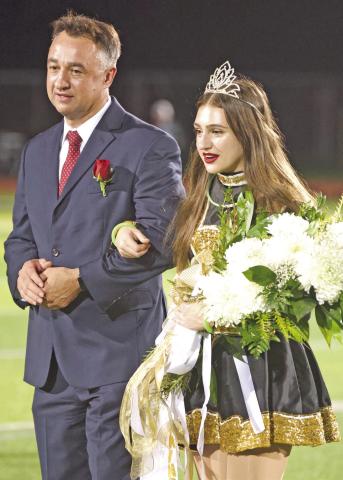 VHS senior Tamra Harris was crowned as the 2023 Vidor High School Homecoming Queen Friday in unplanned pre-game festivities. Due to the failure of a portion of the field lighting, all halftime activities were held before the kickoff, which was delayed almost 90 minutes due to the malfunction.