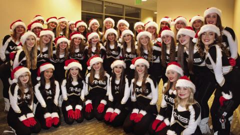 The Vidor High School Brigadettes, dressed in bright holiday garb, wowed the crowd with their synchronized hand routines set to holiday music at their Vidor City Hall performance under the direction of Cherise Fawcett.