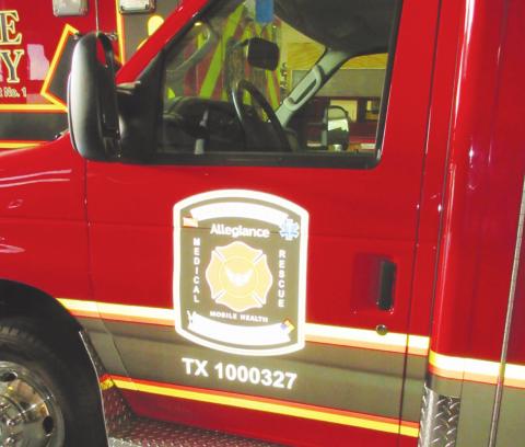The new Allegiance Mobile Health ambulances are painted fire-engine red and have the words “Orange County Emergency Services District No. 1” prominently painted on their sides. They start rolling out for emergency services in the fire district on August 16th. Photo by George Garza