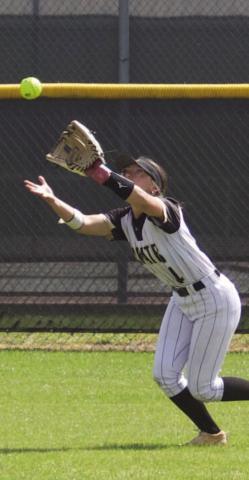 Alyssa Korman catches a fly on the run to end the inning late in the game Tuesday.