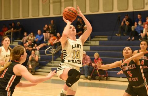 Natalie Morrison shoots for two in the Championship round of the WOS Tournament Thursday. Photo by Randall Luker