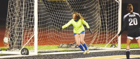 Lady Pirate Jaden Lee watches as a shot to the corner slips by the Kelly goal keeper for a Vidor score