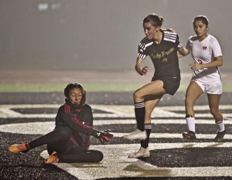 Bull scores Taylor Bull scores past the Lady Wildcats fallen goalkeeper Tuesday night. Bull led the Lady Pirates in scoring with three.