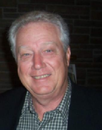 Ask Rusty – My Husband Still Works; Must He Enroll in Medicare at age 65?