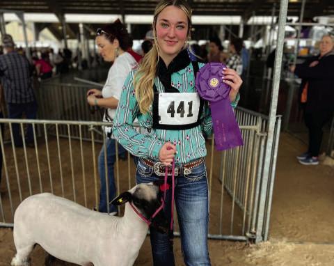 Laikyn Reese was Champion Lightweight Market Lamb and 10th Overall.