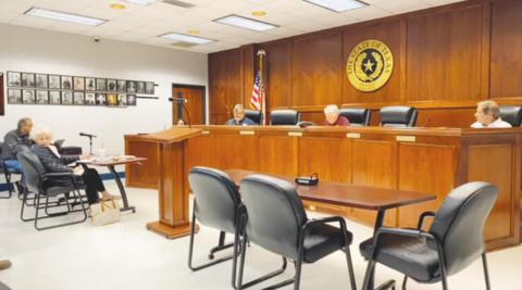 The Orange County Commissioners’ Court, seen here practicing social distancing back in April of this year, voted unanimously last week to invoke a special clause of Senate Bill 2 that will allow Orange County to file for special taxing unit status in order to bypass the new law’s three and a half percent property tax increase cap when the Court sets a proposed 2020-2021 tax rate this week.