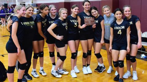 Freshman Lady Pirates place second at Silsbee Tournament and pose with their plaque Saturday. Photos by Randall Luker