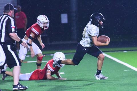 Daigen Venable broke several tackles before he cleared the BC secondary on his way to a Pirate touchdown Thursday. Photo by Randall Luker