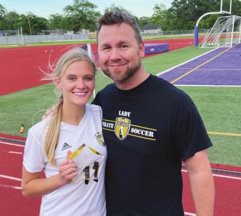 Brooklyn Healy with Vidor Head Girls Soccer Coach Ralph Fields.