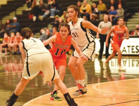 Eighth A Lady Pirates Lakyn Croak, #1, and #31, Kinsey Dillard defend agains a charging Lady Bobcat.