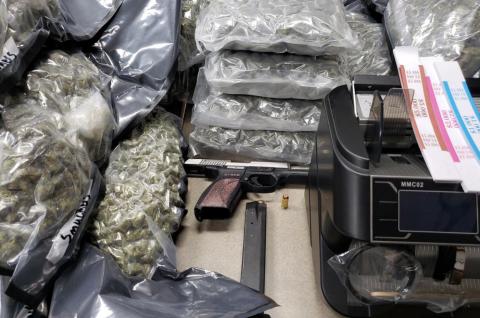 Driver crashes flees leaving weed and stolen pistol