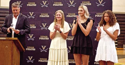 VHS Girls Athletic Coordinator Shad Smith presented the awards for Heart of the Lady Pirates and Outstanding Female Athlete at the Lady Pirate Athletic Awards ceremony Tuesday. Pictured are left to right, Smith, Madison Powell, Raegan Stephenson and Kenya Correia.