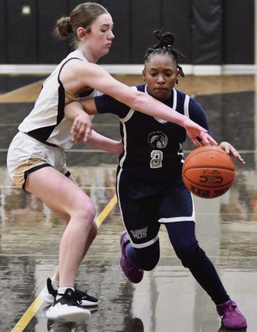 Hadlie Jackson attempts a steal Tuesday versus WOS.