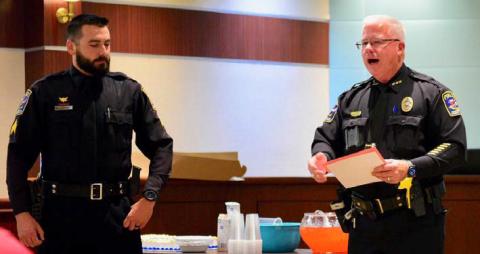 VPD officer Ethan Mansfield, left, was promoted to the rank of sergeant by VPD Chief Rod Carroll, left, in a cermony held at Vidor City Hall Monday. Courtesy Photos