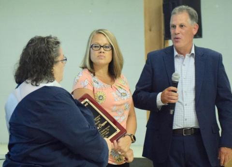 Captain Aleta Cappen is presented an appreciation plaque for her years of service to the city of Vidor by Mayor Misty Songe, center, and Vidor City Manager Robbie Hood, right, at her retirement celebration at The Oaks. Orange County and Texas Speaker of the House Date Phelan were also among those presenting Cappen with tokens of appreciation for her dedication and service to the community. Photo by Randall Luker