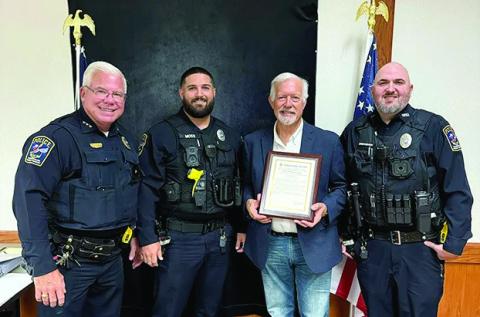 Heroes recognized Congressman Randy Weber stopped in Vidor last week to recognize two local heroes. Vidor Police Department officers Moss and Stephenson were recognized for saving two children trapped in a burning home in Vidor on September 10. Pictured are, Vidor Police Chief Rod Carroll, Officer Moss, Congressman Randy Weber, Officer Stephenson