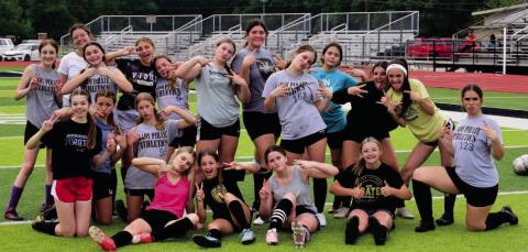 Vidor’s 8th grade Lady Pirate soccer team mugs for the camera after practice this week. This marks the first year for the 7th and 8th grade junior high girls soccer program at VISD. After a rainout last week, both teams will play their first game Thursday versus Central at Pirate Stadium with the 7th grade team at 5:30 and 8th grade at 6:50 p.m. Photo by Randall Luker