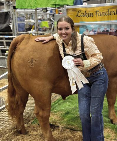 VHS Senior Ag student Lakin Funderburke’s Medium Weight Red Cross steer placed third at the Houston Livestock Show and Rodeo to earn an auction slot and sold for $10,000 Saturday.