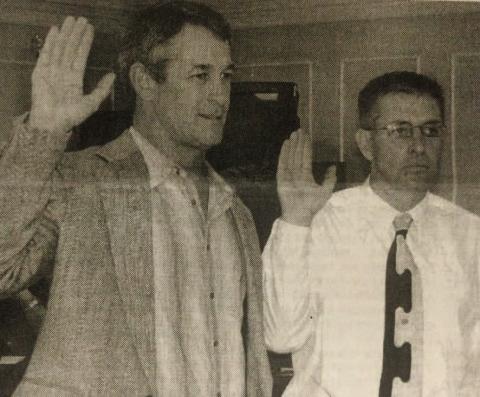 Returning VISD Trustee Tim Harland (left) and newly elected school board Trustee David Camp take the Oath of Office, as they are sworn-in as school district Trustees Tuesday night. Archive Photo