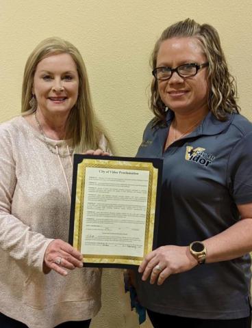 Pictured is Mayor Misty Songe presenting CTE Director Penny Singleton with a signed Proclamation Document. VISD Courtesy Photo