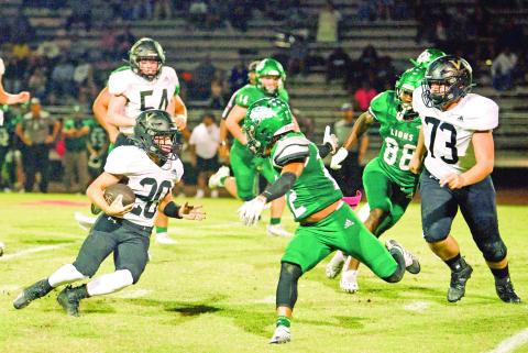 Vidor QB Daigan Venable breaks into the Lions secondary on a keeper that picked up a first down Friday.