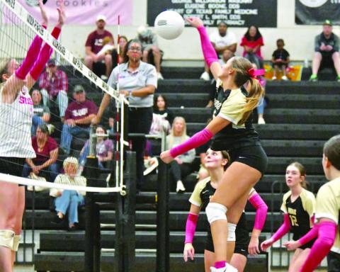 Paisley Miller returns the ball in Tuesday night showdown with Silsbee to claim a playoff spot.
