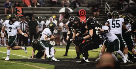 Vidor’s defensive line bars the way for an Indian ball carrier in Friday’s home opener versus the Santa Fe Indians.