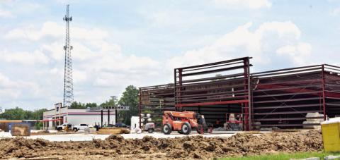 The SE corner of the Highway 12-FM 1132 intersection is a construction hotspot with two commercial properties being developed currently. A Valero gas/convenience store, background, is making progress after a delay in the availability of underground gas tanks slowed construction while its neighbor in the foreground will be a Family Dollar/Dollar Tree Combo store. Courtesy Photo