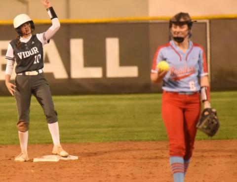 Andrea Garrett celebrates after hitting a double. Photo by Randall Luker