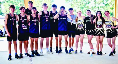 VHS Cross Country Team (Left to Right) Braedyn Leger, Nathan Fawcett, Coach Smith, Jose Guerrero - Evans, Michael Huish, George Williamson, Zane Williamson, Coy Lightfoot, (Girls) Kynnison Cook, Averie Garris, Isabella Findley, Lexi White. (not pictured) Lily Hyde.