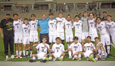 Pirates celebrate their bi-district win Monday.