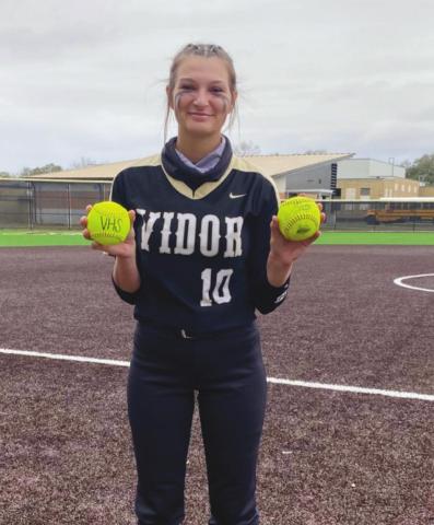 Andreya Garrett holds her two home run balls from the Hardin game.