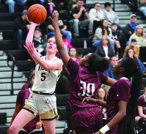 Hadley Jackson shoots from the outside in Friday’s home game versus Silsbee.