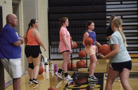 Several Lady Pirates practiced their basketball skills Tuesday morning in the newly waxed Pirate Gym. The ladies practiced their passing and shooting from different positions on the court.