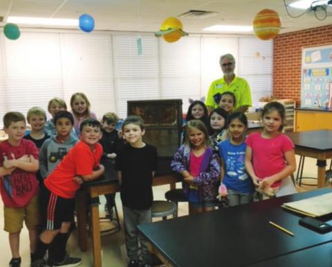 Local beekeeper pays a visit to Pine Forest Elementary