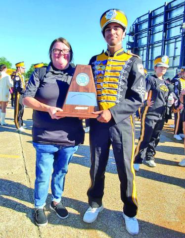 Vidor High School student Michael Rodriguez has received the National Hispanic Recognition Award from the College Board. This award is given to those individuals with Outstanding GPA and Outstanding Performance on PSAT. Rodriguez is pictured with Kara Philips, VISD Director of Fine Arts and VHS Band Director. Photo courtesy Vidor ISD.
