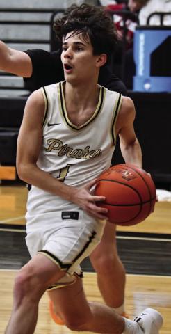 Bryce Loftin, #5, led the Pirates in scoring versus Bridge City with 20 points.