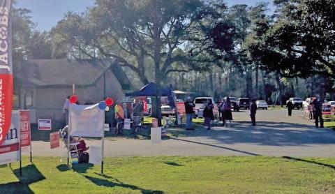 Candidates, supporters and voters mingled under the shade of oak trees at the Vidor Community Center as early voting in the Republican and Democrat primary elections kicked off Tuesday. A steady stream of voters took advantage of early voting with 349 in person ballots cast in Vidor. A total of 948 ballots, both by mail (72) and in-person (877) were tallied Tuesday.