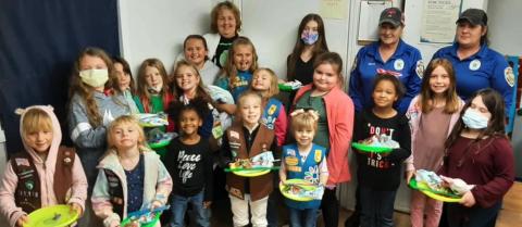 Girl Scouts donate pet supplies