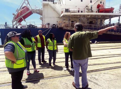 Teacher Externs Brandy Whisenant, of Vidor High School; Nadria Turner, of Lincoln Middle School; Michael Blakeney, of Bridge City High School; Alecia Jackson, of Beaumont United High School and Jamie Morgan of Monsignor Kelly Catholic High School take a tour of the Port of Port Arthur by Ronnie Hicks, Director of Operations for the port. Courtesy Photo Port of Port Arthur