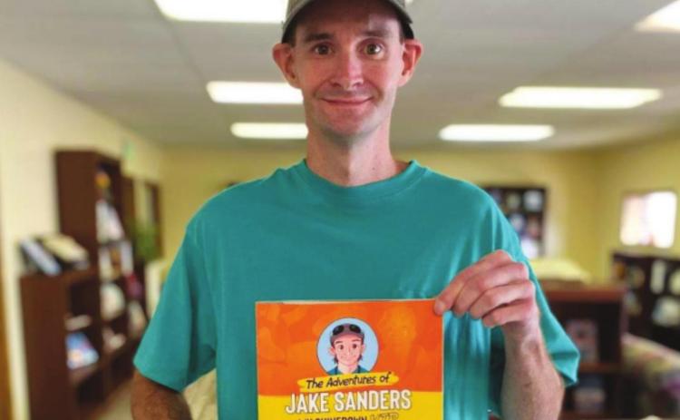 Sanders pens book for charities