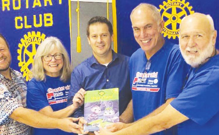 Disaster AID USA team pays visit to Rotary Club meeting