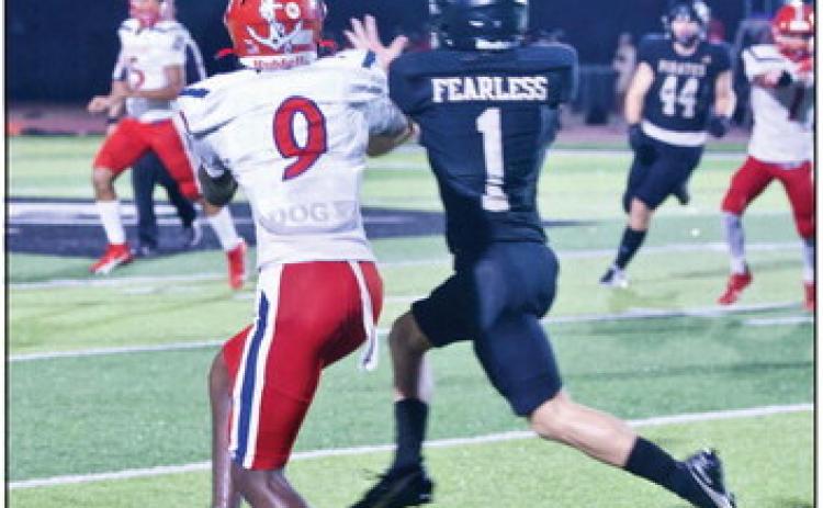 Westin Baker intercepted this ball on the run and sprinted 70 yards for a touchdown against the Exporters Friday in Vidor. Photo by Randall Luker