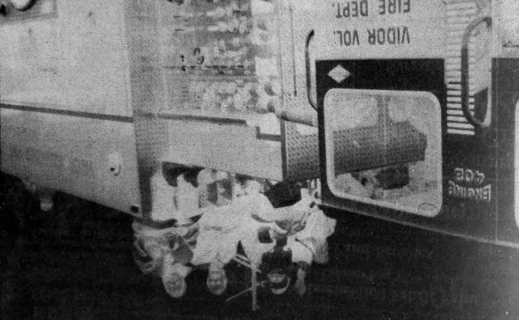 Santa Claus rides atop the Vidor Volunteer Fire Department's Engine 409 during the annual Christmas parade Saturday. While he was out of reach of children during the parade, he met a lot of them during the Christmas tree lighting later that evening