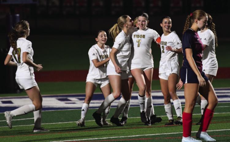 Lady Pirates react after the game-winning penalty kick at HF.